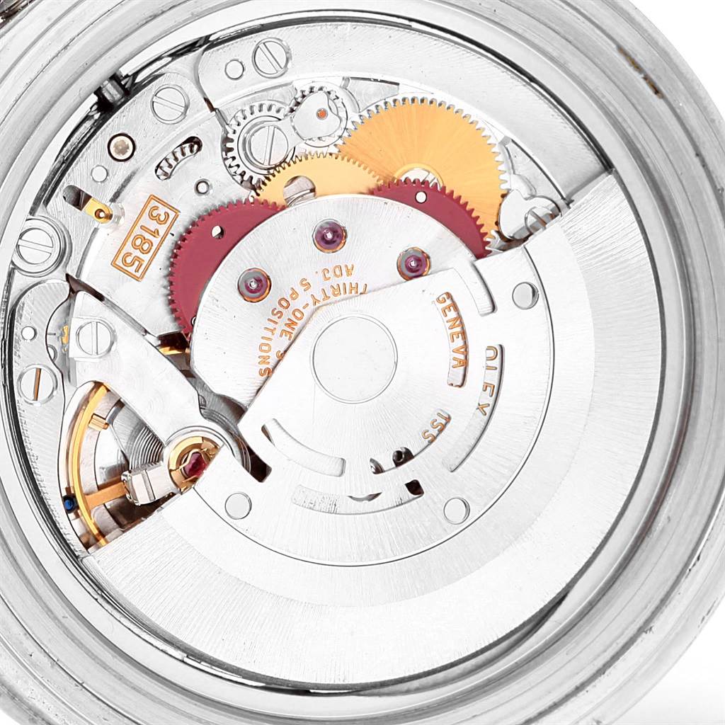 This image shows the internal movement mechanism of a Rolex GMT-Master 16710 Men's Stainless Steel Black Dial 16710 Men's Stainless Steel Black Dial watch, highlighting gears and mechanical components.