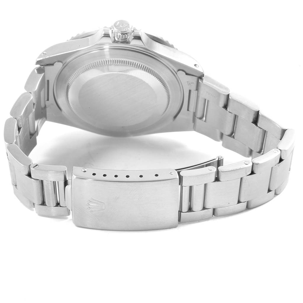 The image shows the back view of the Rolex GMT-Master 16710 Men
s Stainless Steel Black Dial 16710 Men
s Stainless Steel Black Dial watch, including the case back, crown, and bracelet with clasp.