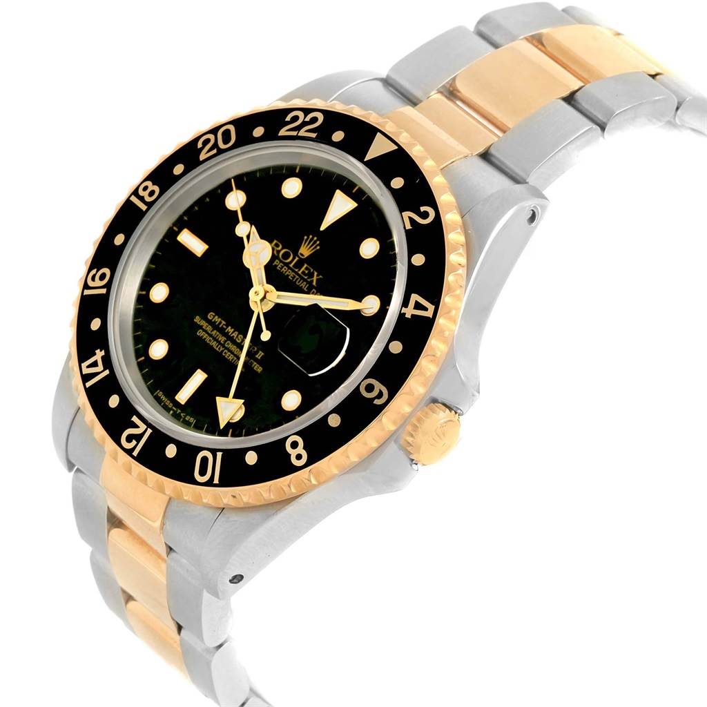 This image shows a Rolex GMT-Master 16713 Men's Stainless Steel Black Dial 16713 Men's Stainless Steel Black Dial watch at an angle highlighting its bracelet, bezel, and dial.