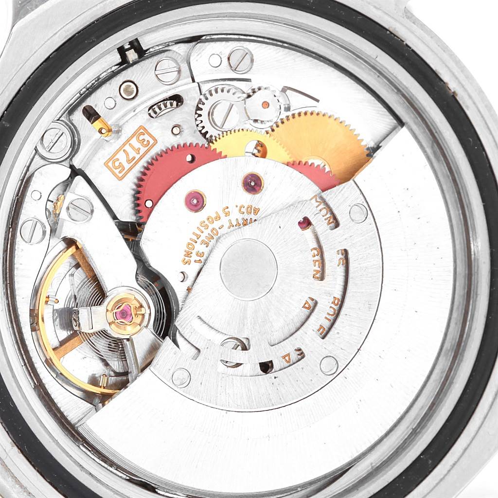 This image shows the internal mechanism of a Rolex GMT-Master 16700 Men's Stainless Steel Black Dial 16700 Men's Stainless Steel Black Dial watch, highlighting its intricate gears and rotating components.
