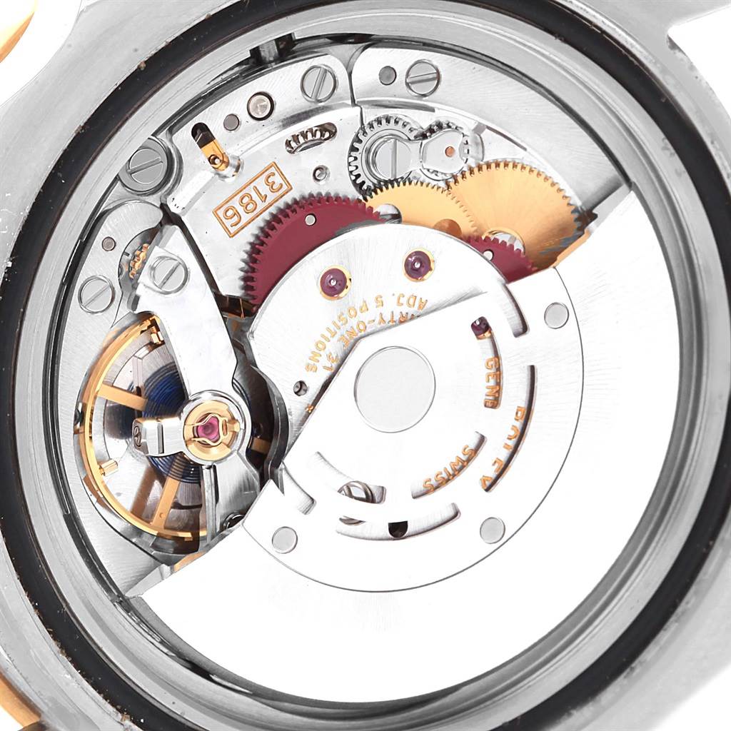 This image shows the internal mechanical movement of a Rolex GMT-Master 116713 Men's Stainless Steel Black Dial 116713 Men's Stainless Steel Black Dial watch viewed from the back.