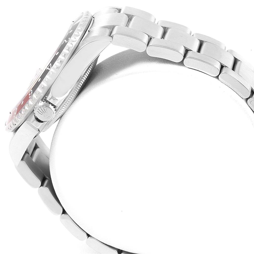 This image shows a side view of the Rolex GMT-Master 16710 Men's Stainless Steel Black Dial 16710 Men's Stainless Steel Black Dial watch, highlighting the crown, bezel, and bracelet.