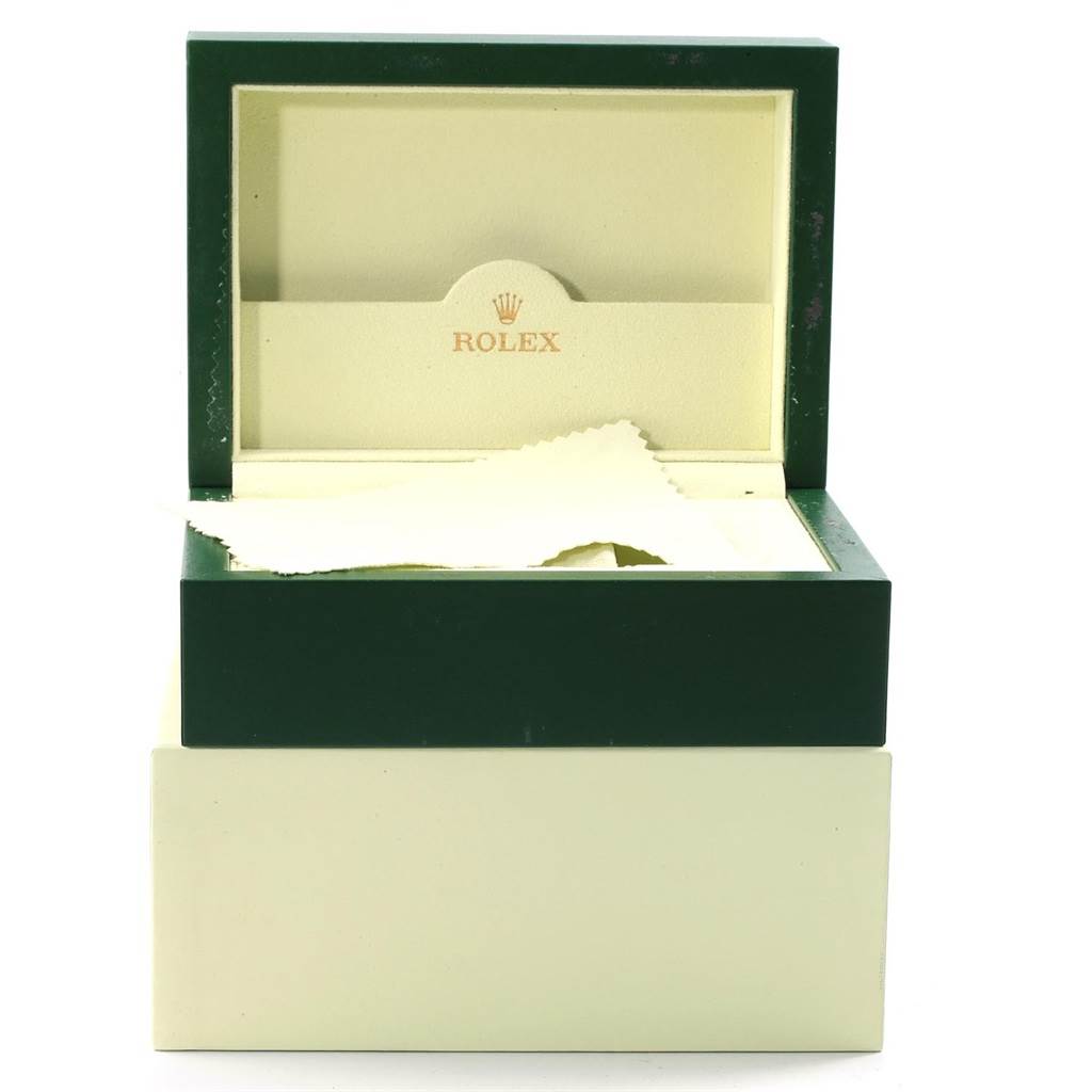 This image shows an open Rolex GMT-Master 16710 Men's Stainless Steel Black Dial 16710 Men's Stainless Steel Black Dial watch box with a cleaning cloth inside.