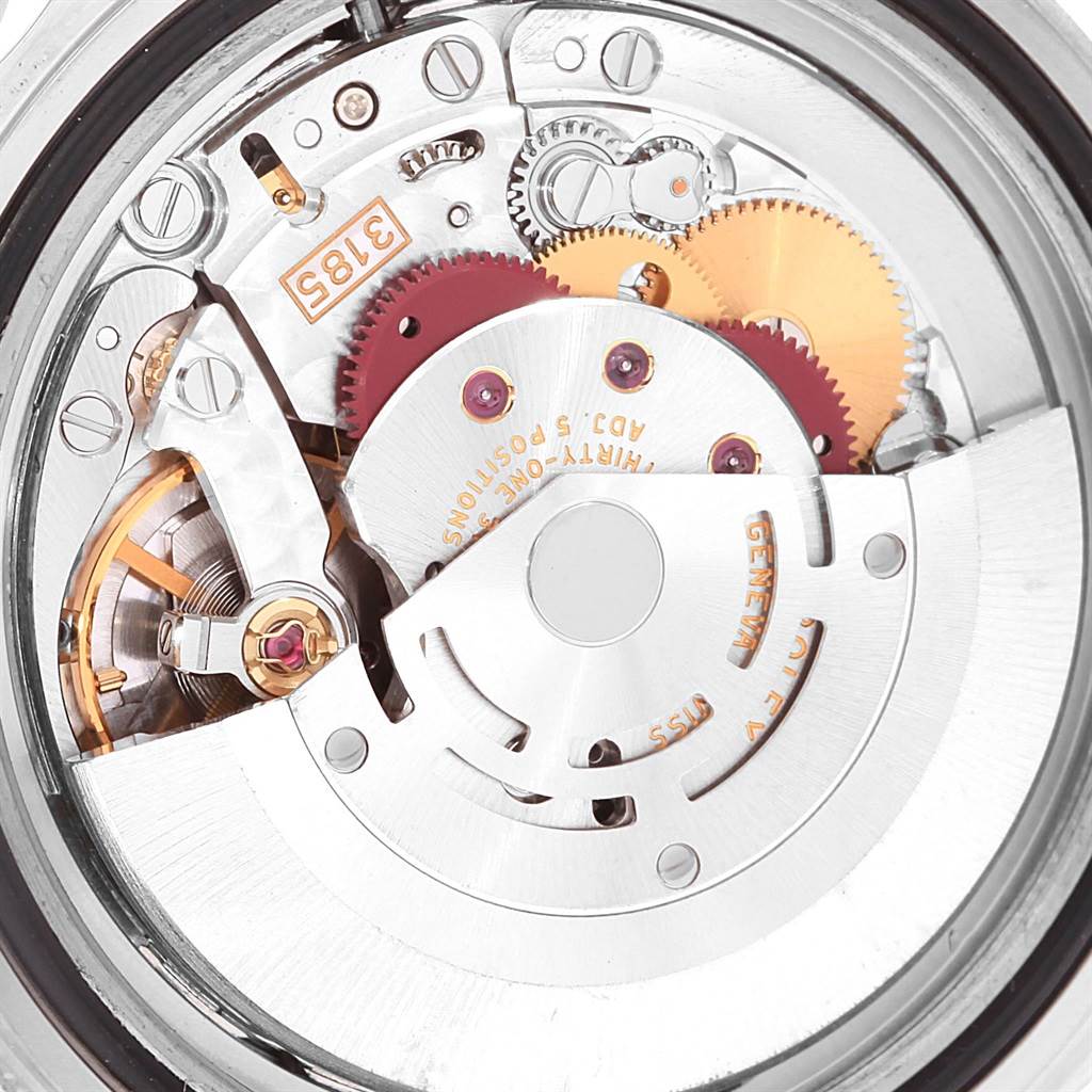 This image shows the intricate movement and internal mechanics of a Rolex GMT-Master 16710 Men's Stainless Steel Black Dial 16710 Men's Stainless Steel Black Dial watch from a top-down angle.