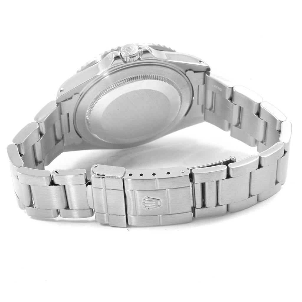 The image shows the back view of a Rolex GMT-Master 16710 Men's Stainless Steel Black Dial 16710 Men's Stainless Steel Black Dial watch, highlighting the case back and stainless steel bracelet with a clasp.