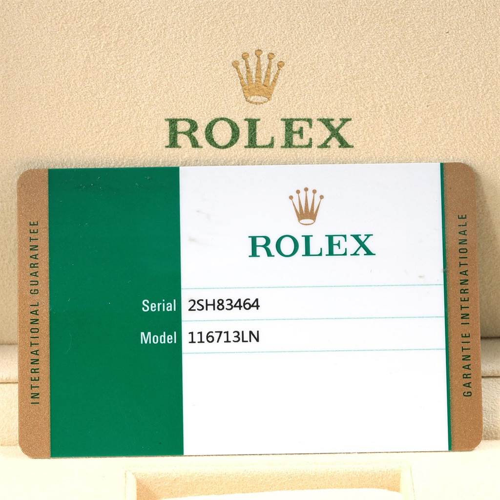 This image shows the serial and model number card for a Rolex GMT-Master 116713 Men's Stainless Steel Black Dial 116713 Men's Stainless Steel Black Dial, model number 116713LN.