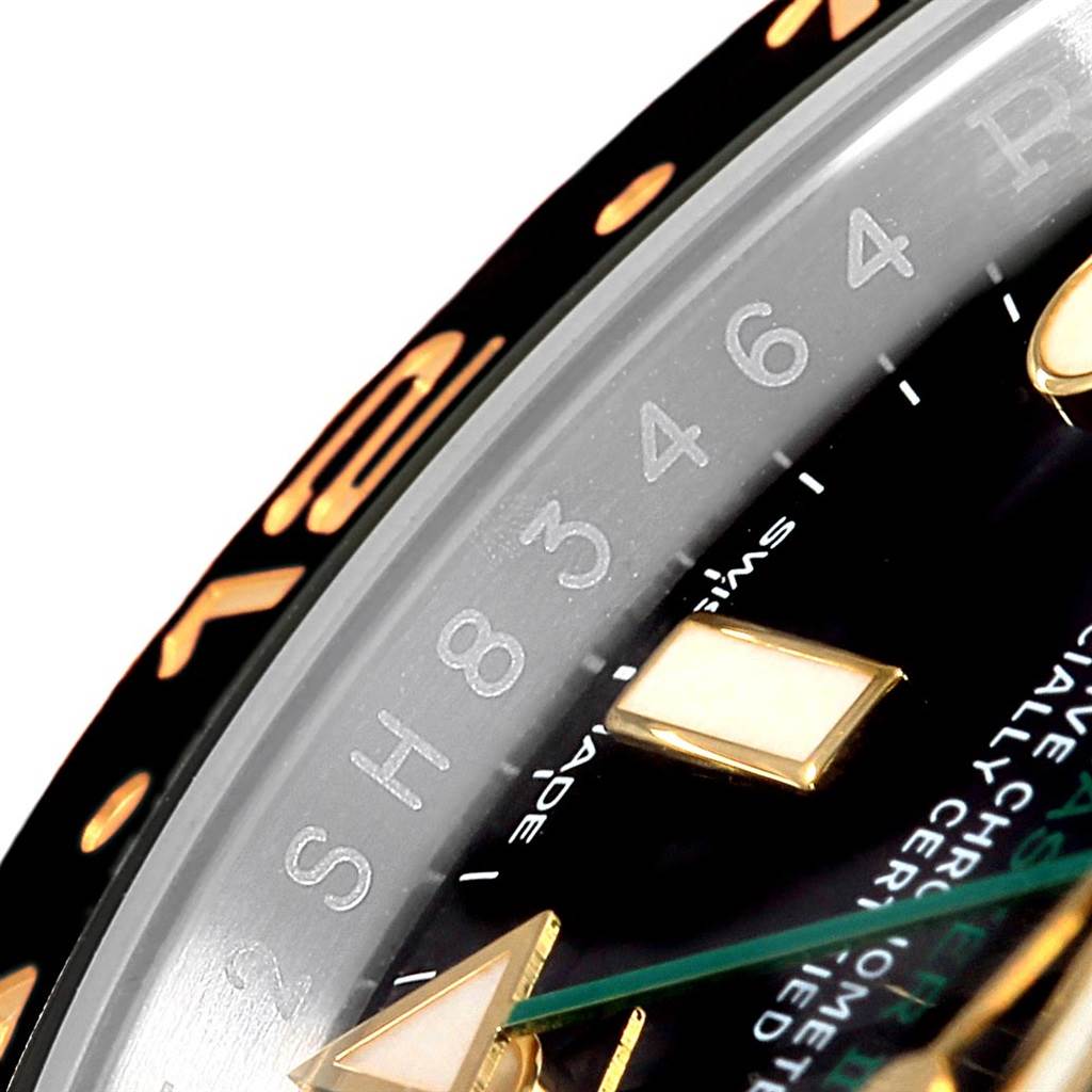 Close-up view of the GMT-Master Rolex watch showing its bezel, dial, and hour markers.