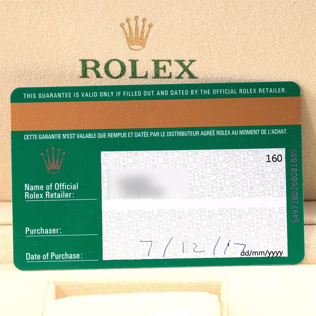 The image shows a close-up of a Rolex guarantee card for the Rolex GMT-Master 116713 Men's Stainless Steel Black Dial 116713 Men's Stainless Steel Black Dial, including the logo and blank fields for purchase details.
