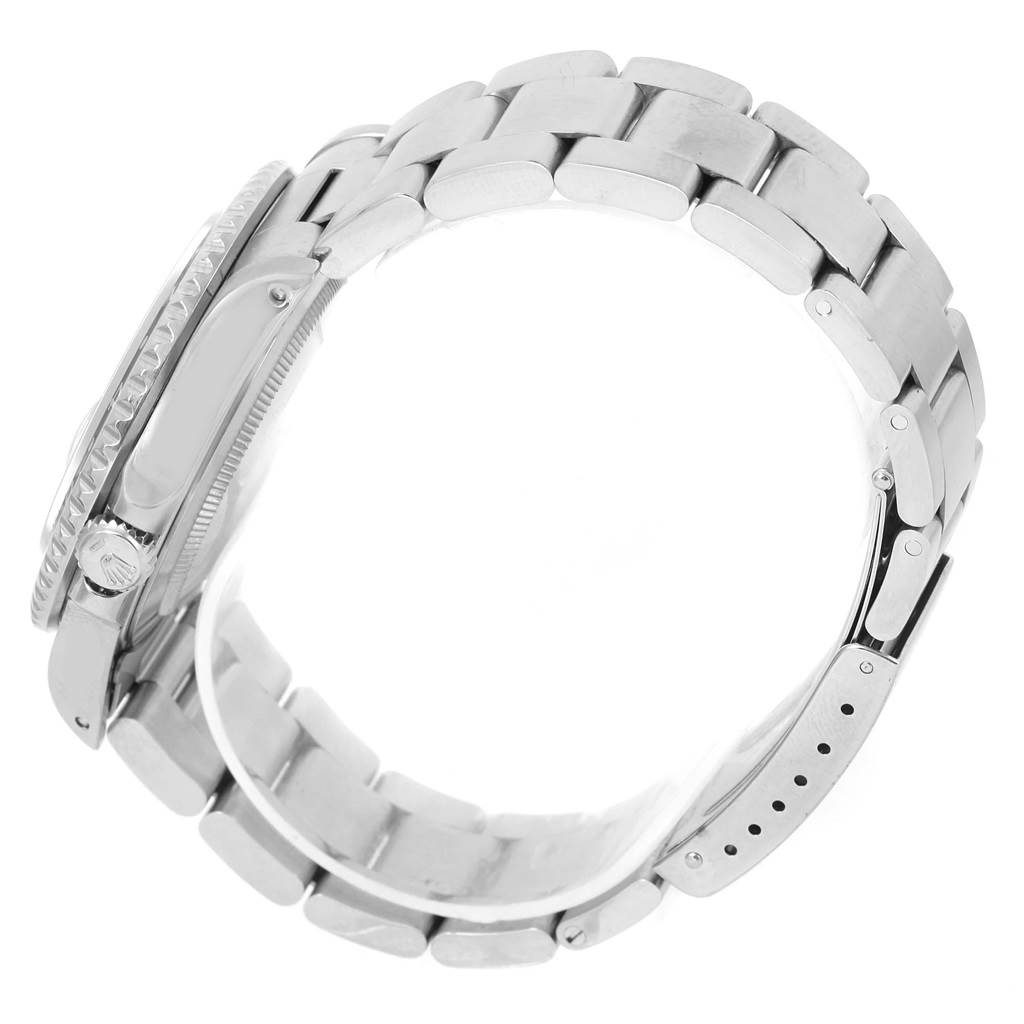 The image shows a side angle view of a Rolex GMT-Master 16710 Men's Stainless Steel Black Dial 16710 Men's Stainless Steel Black Dial watch focusing on the metal bracelet and clasp.