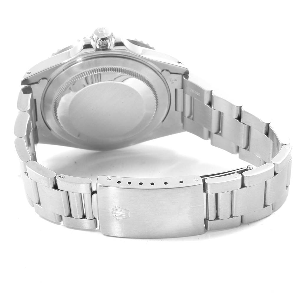 The image shows the back of the Rolex GMT-Master 16710 Men's Stainless Steel Black Dial 16710 Men's Stainless Steel Black Dial watch and its metal bracelet clasp.