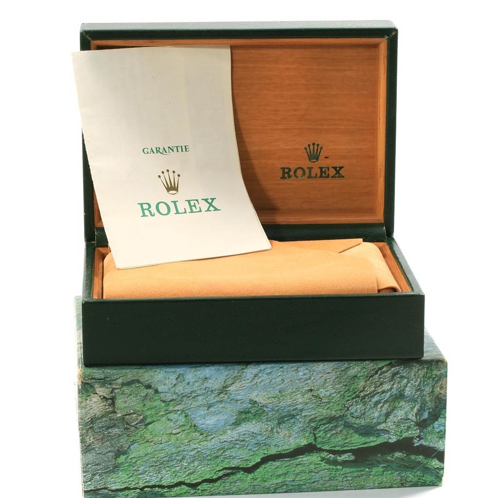 The image shows a Rolex GMT-Master 16710 Men's Stainless Steel Black Dial 16710 Men's Stainless Steel Black Dial watch box, partially opened, with a warranty card inside.