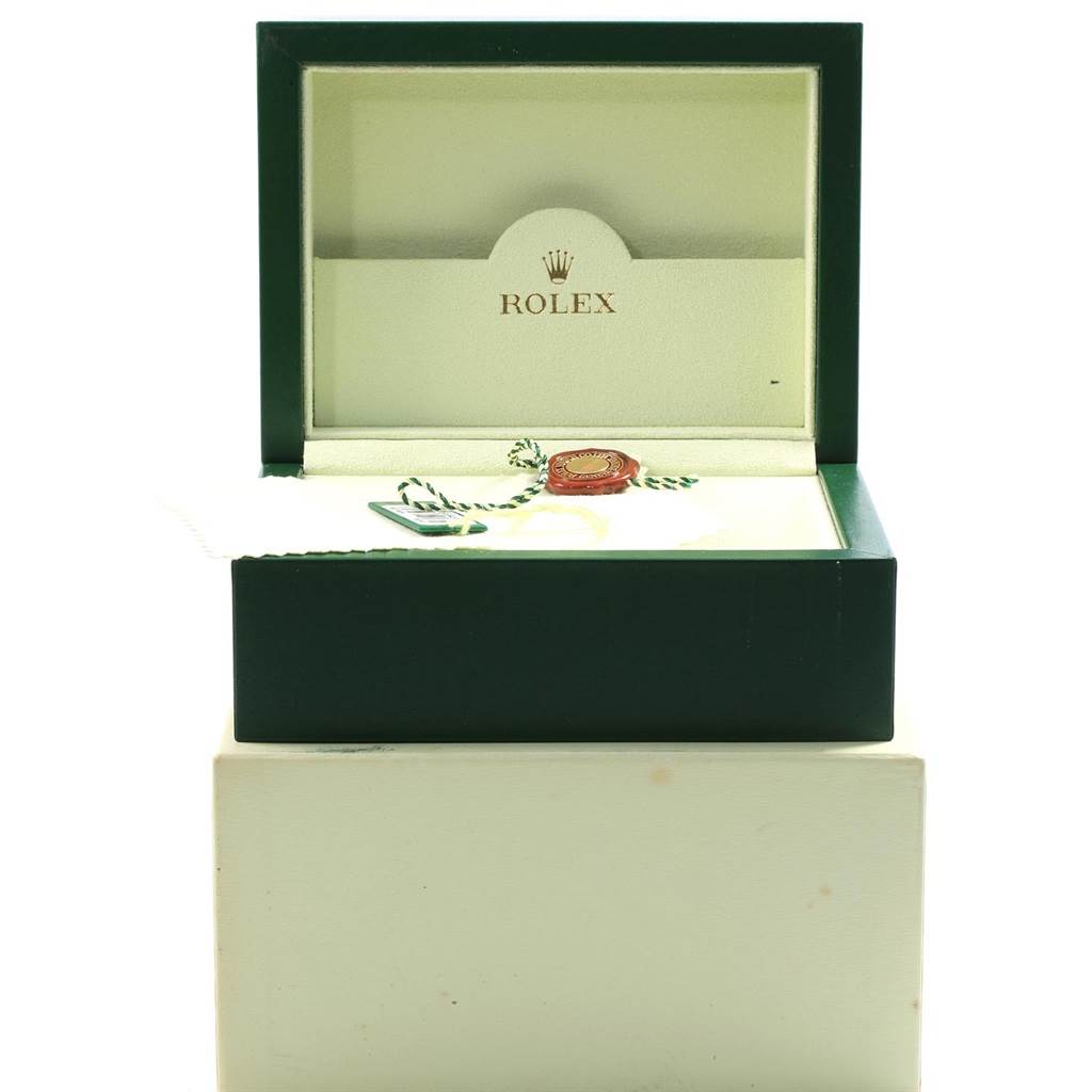 The image shows an open box for a Rolex GMT-Master 16713 Men
s Stainless Steel Black Dial 16713 Men
s Stainless Steel Black Dial watch, with no watch but some accessories and tags inside.