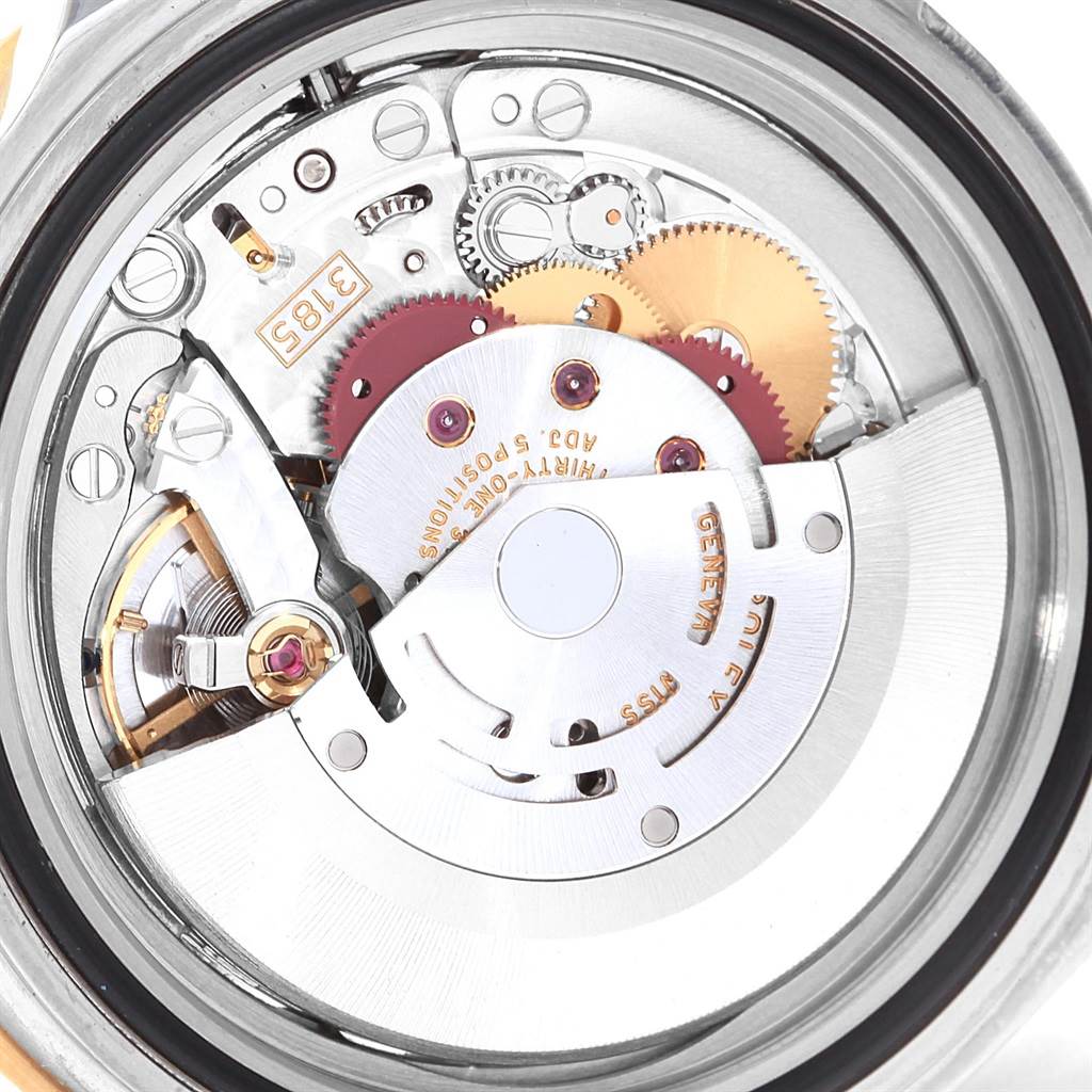 This image shows a close-up of the Rolex GMT-Master 16713 Men
s Stainless Steel Black Dial 16713 Men
s Stainless Steel Black Dial watch
s internal movement mechanism.