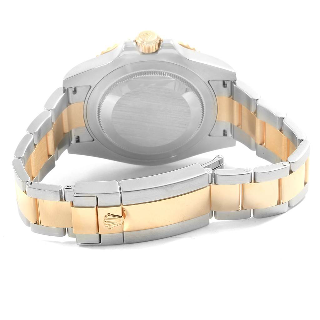 The image shows the back view and bracelet of a Rolex GMT-Master 116713 Men's Stainless Steel Black Dial 116713 Men's Stainless Steel Black Dial watch, featuring a two-tone metal design.