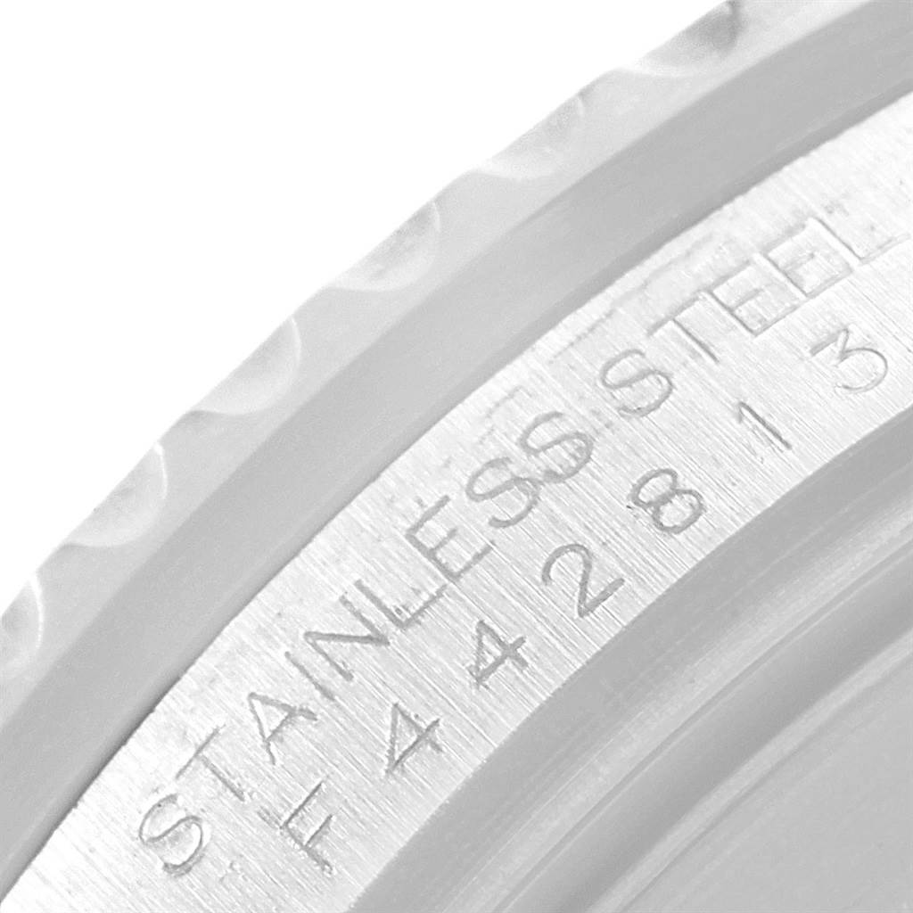 This image shows a close-up angle of the stainless steel case back with engraved details of the Rolex GMT-Master 16710 Men's Stainless Steel Black Dial 16710 Men's Stainless Steel Black Dial watch.