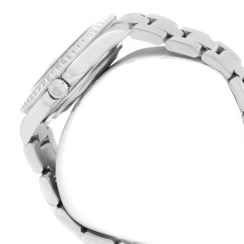 The image shows a side view of a Rolex GMT-Master 16710 Men's Stainless Steel Black Dial 16710 Men's Stainless Steel Black Dial watch case and bracelet, highlighting the crown and part of the bezel.