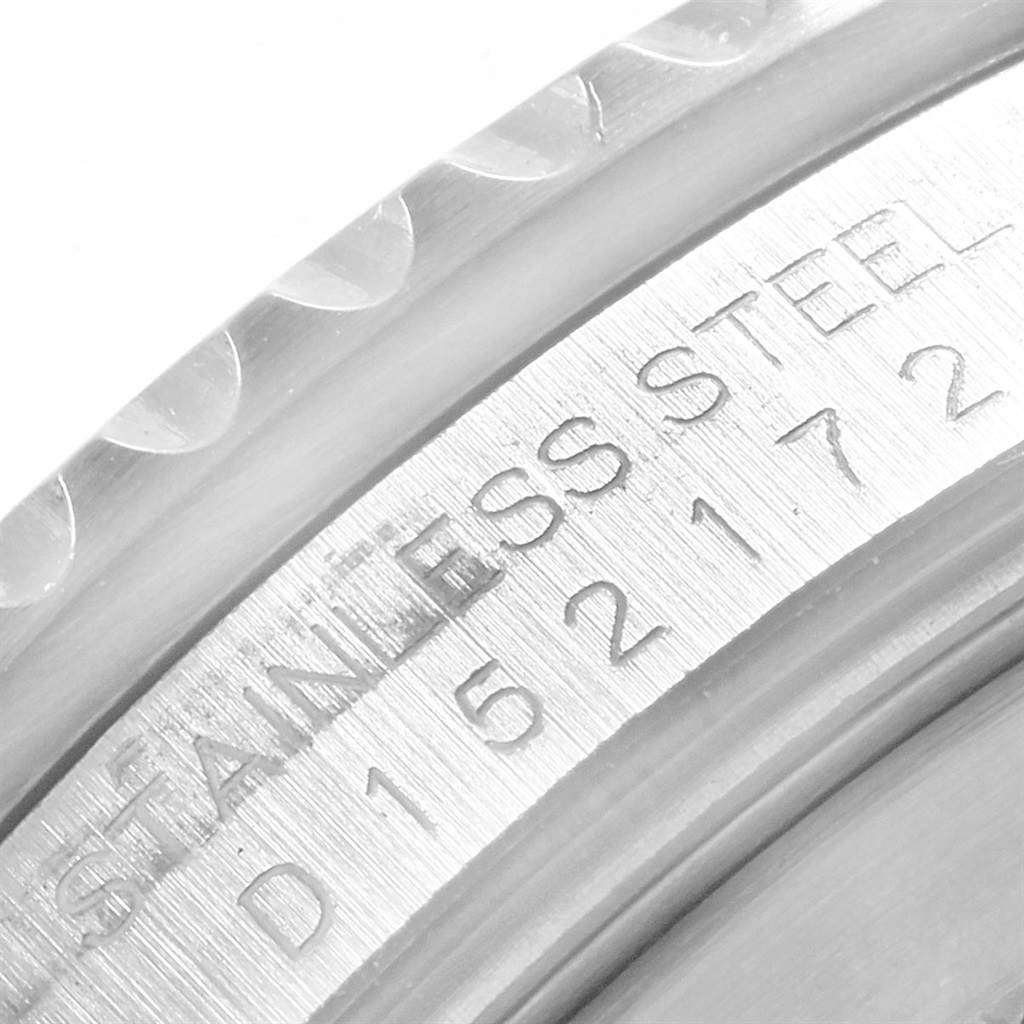 This close-up image shows the engraved serial number and "STAINLESS STEEL" on the side of a Rolex GMT-Master 16710 Men
s Stainless Steel Black Dial 16710 Men
s Stainless Steel Black Dial watch.