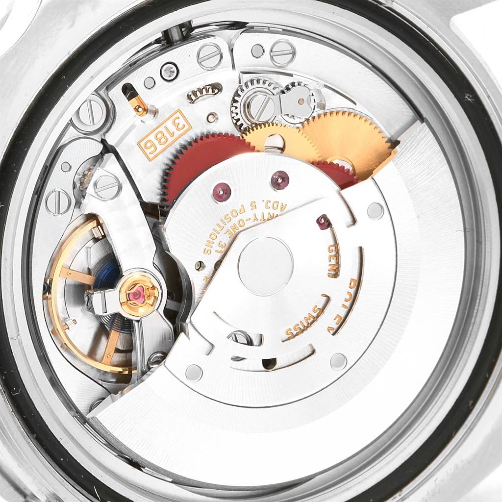 This image shows the intricate internal mechanical movement of a Rolex GMT-Master 116710 Men
s Stainless Steel Black Dial 116710 Men
s Stainless Steel Black Dial watch.