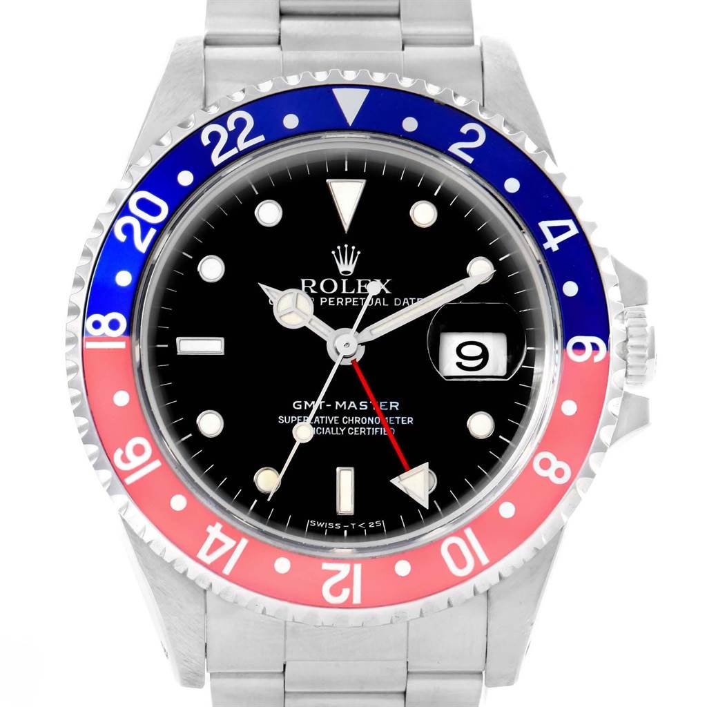 The image shows a front view of the Rolex GMT-Master 16700 Men's Stainless Steel Black Dial 16700 Men's Stainless Steel Black Dial watch, highlighting the dial, bezel, hands, and bracelet.