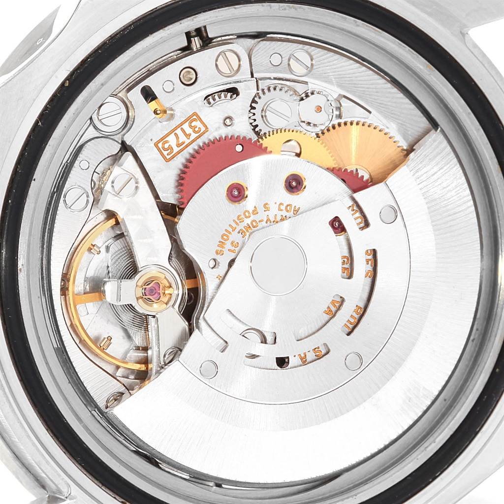 This image shows the inner mechanism and movement of a Rolex GMT-Master 16700 Men's Stainless Steel Black Dial 16700 Men's Stainless Steel Black Dial watch from the back angle.