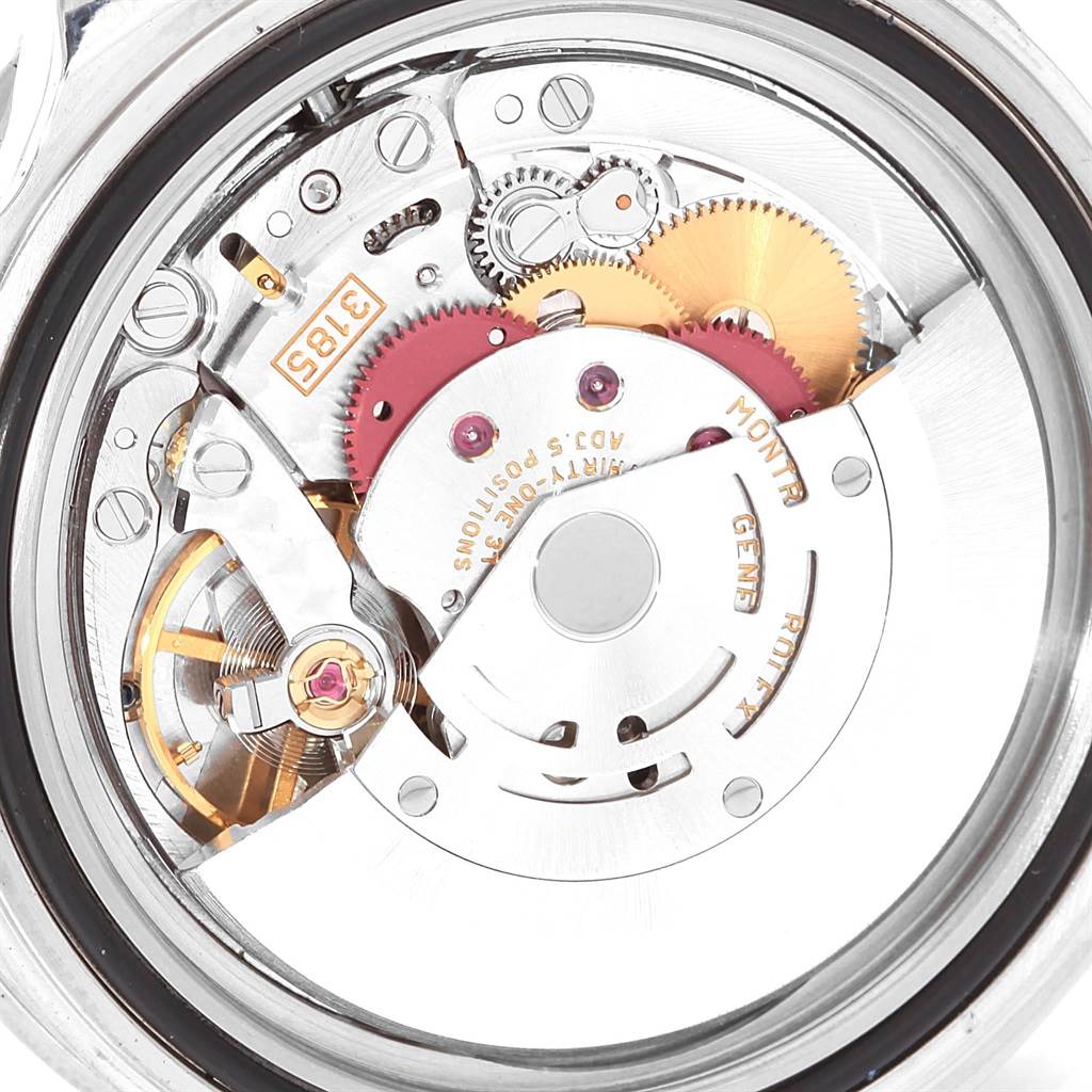 This is an image of the movement of a Rolex GMT-Master 16710 Men's Stainless Steel Black Dial 16710 Men's Stainless Steel Black Dial watch showing its internal mechanical components from the back.