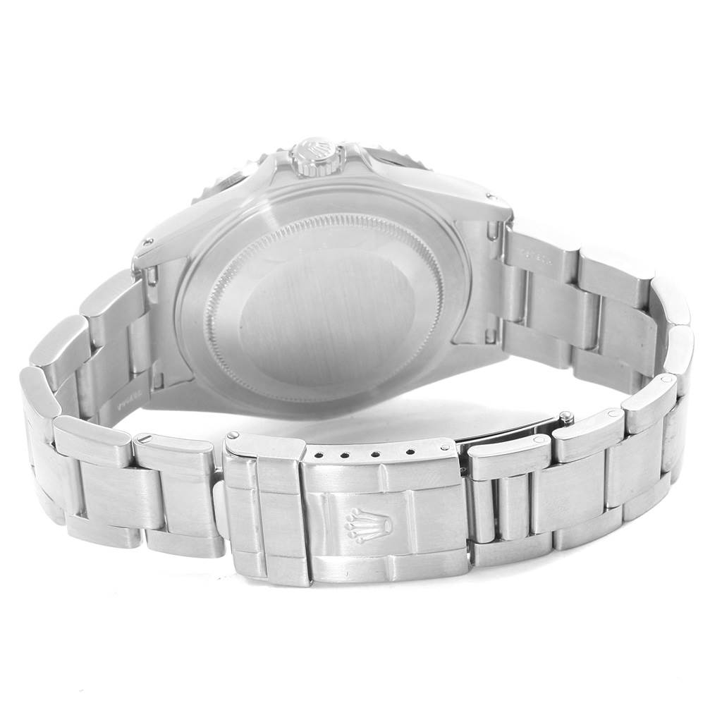 This image shows the back case and bracelet of a Rolex GMT-Master 16710 Men's Stainless Steel Black Dial 16710 Men's Stainless Steel Black Dial watch, highlighting the clasp with the Rolex logo.