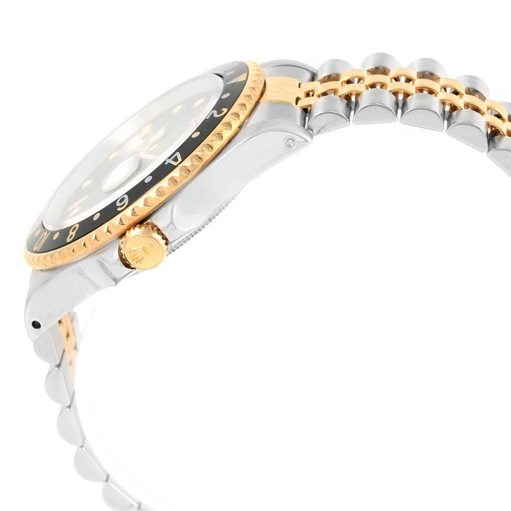 This side view shows the case, crown, bezel, and bracelet of the Rolex GMT-Master 16713 Men's Stainless Steel Black Dial 16713 Men's Stainless Steel Black Dial watch.