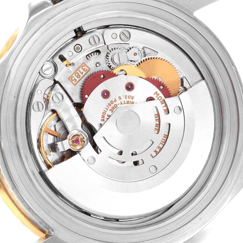 This image shows the movement mechanism of a Rolex GMT-Master 16713 Men's Stainless Steel Black Dial 16713 Men's Stainless Steel Black Dial watch from a top view.