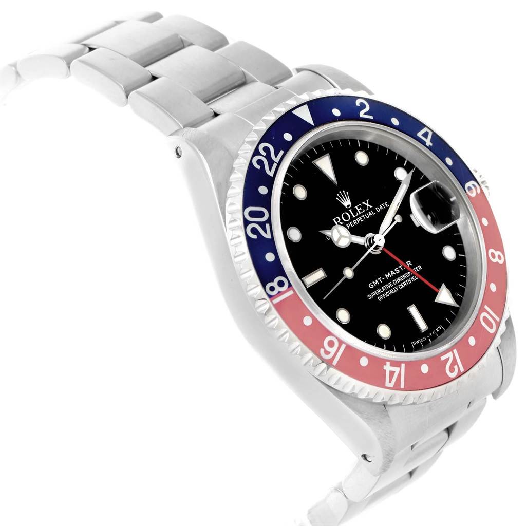 The Rolex GMT-Master 16700 Men's Stainless Steel Black Dial 16700 Men's Stainless Steel Black Dial watch is shown at an oblique angle, displaying the face, bezel, and part of the bracelet.