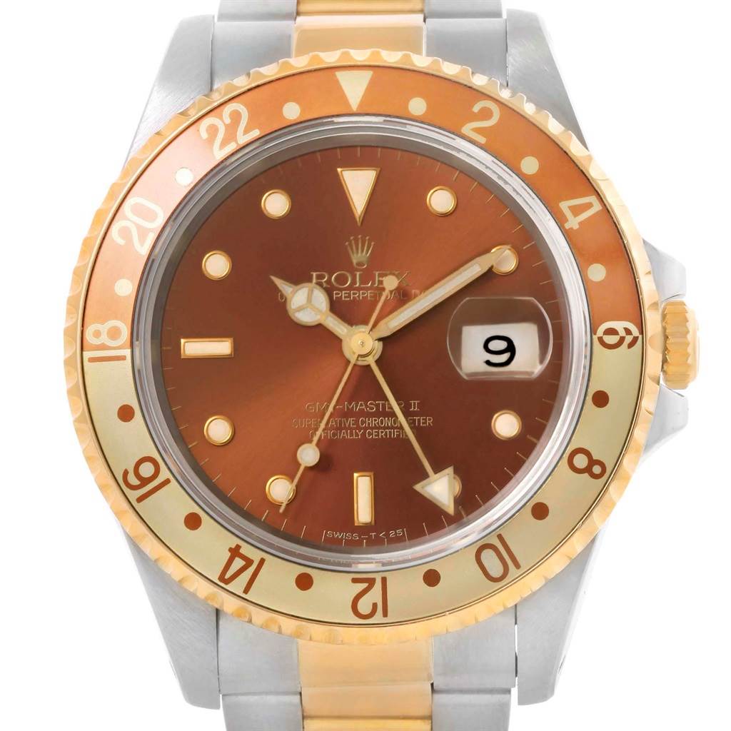 The image shows a frontal view of the Rolex GMT-Master 16713 Men's Stainless Steel Brown Dial 16713 Men's Stainless Steel Brown Dial II watch with a brown and gold bezel and a date window displaying "9."