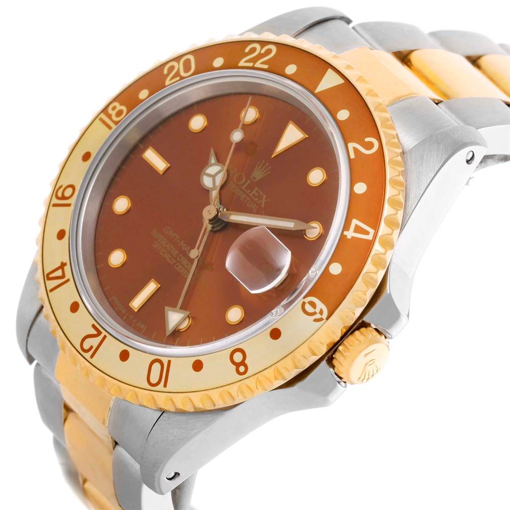 The Rolex GMT-Master 16713 Men's Stainless Steel Brown Dial 16713 Men's Stainless Steel Brown Dial watch is shown from an angled side view, highlighting the crown, bezel, dial, and part of the bracelet.