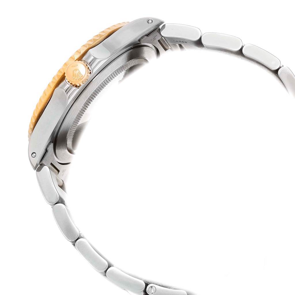 The image shows the side view of a Rolex GMT-Master 16713 Men's Stainless Steel Brown Dial 16713 Men's Stainless Steel Brown Dial, highlighting its crown, bezel, and bracelet.