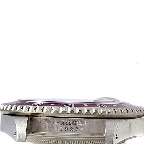 The image shows a side view of a Rolex GMT-Master 16710 Men's Stainless Steel Black Dial 16710 Men's Stainless Steel Black Dial watch, highlighting the case, bezel, and the serial number engraved on the side.