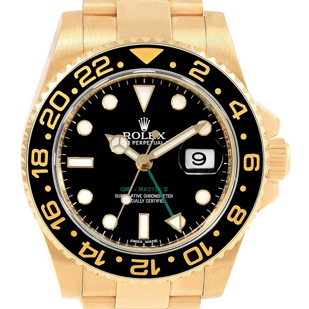 This image shows the front of a Rolex GMT-Master 116718 Men
s Yellow Gold Black Dial 116718 Men
s Yellow Gold Black Dial II watch, focusing on the dial, bezel, and part of the bracelet.