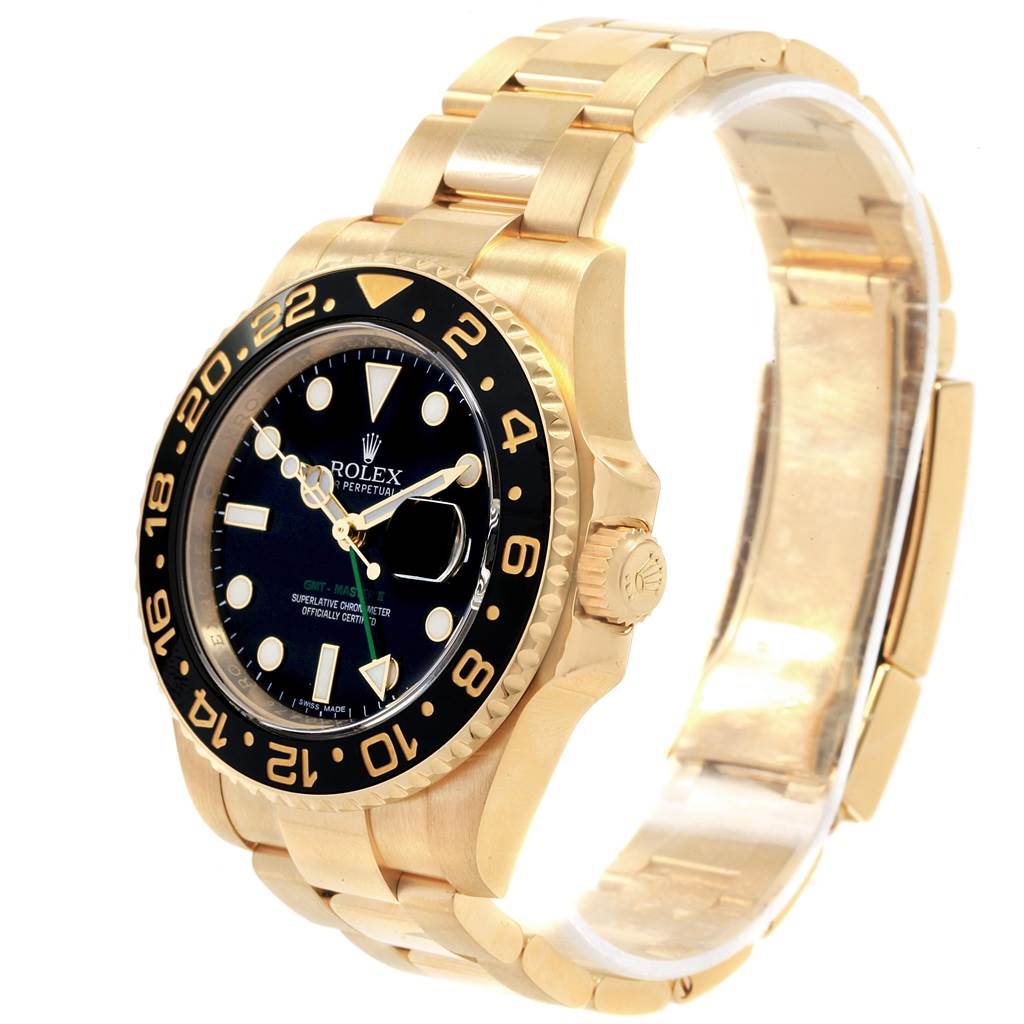 The image shows a side-front angle of a Rolex GMT-Master 116718 Men
s Yellow Gold Black Dial 116718 Men
s Yellow Gold Black Dial watch, highlighting its dial, bezel, and gold bracelet.