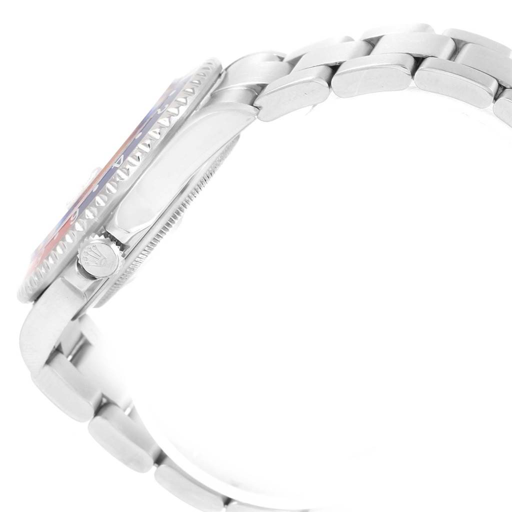 The image shows a side angle of a Rolex GMT-Master 16710 Men's Stainless Steel Black Dial 16710 Men's Stainless Steel Black Dial watch, displaying the crown, bezel, and part of the bracelet.