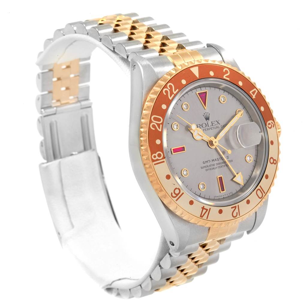 The image shows an angled view of a Rolex GMT-Master 16713 Men's Stainless Steel Grey Dial 16713 Men's Stainless Steel Grey Dial watch, focusing on the face, bezel, and two-tone bracelet.