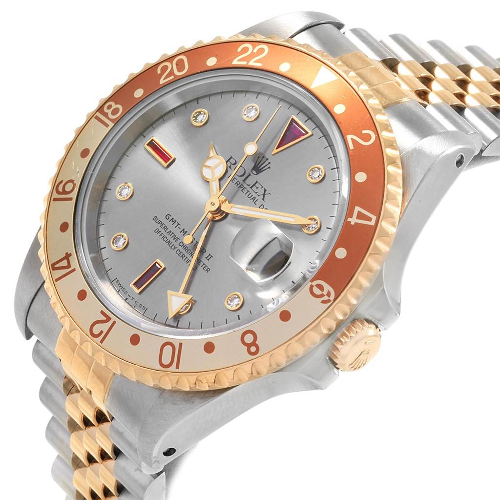 The image shows a Rolex GMT-Master 16713 Men's Stainless Steel Grey Dial 16713 Men's Stainless Steel Grey Dial watch with a two-tone bezel and bracelet, photographed at an angle displaying the face, crown, and part of the bracelet.