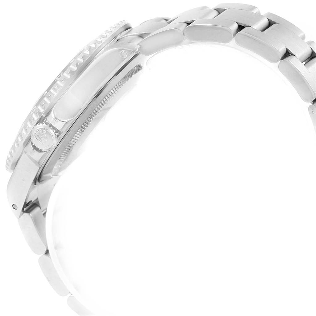 The image shows a side view of the Rolex GMT-Master 16710 Men's Stainless Steel Black Dial 16710 Men's Stainless Steel Black Dial watch, focusing on the crown and the bracelet.