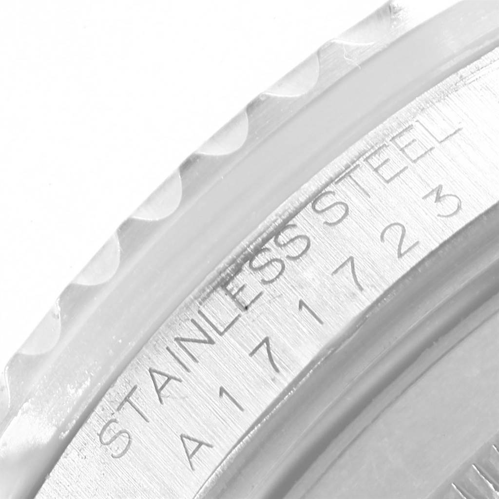 This image shows a close-up of the engraved stainless steel bezel of a Rolex GMT-Master 16700 Men's Stainless Steel Black Dial 16700 Men's Stainless Steel Black Dial watch.