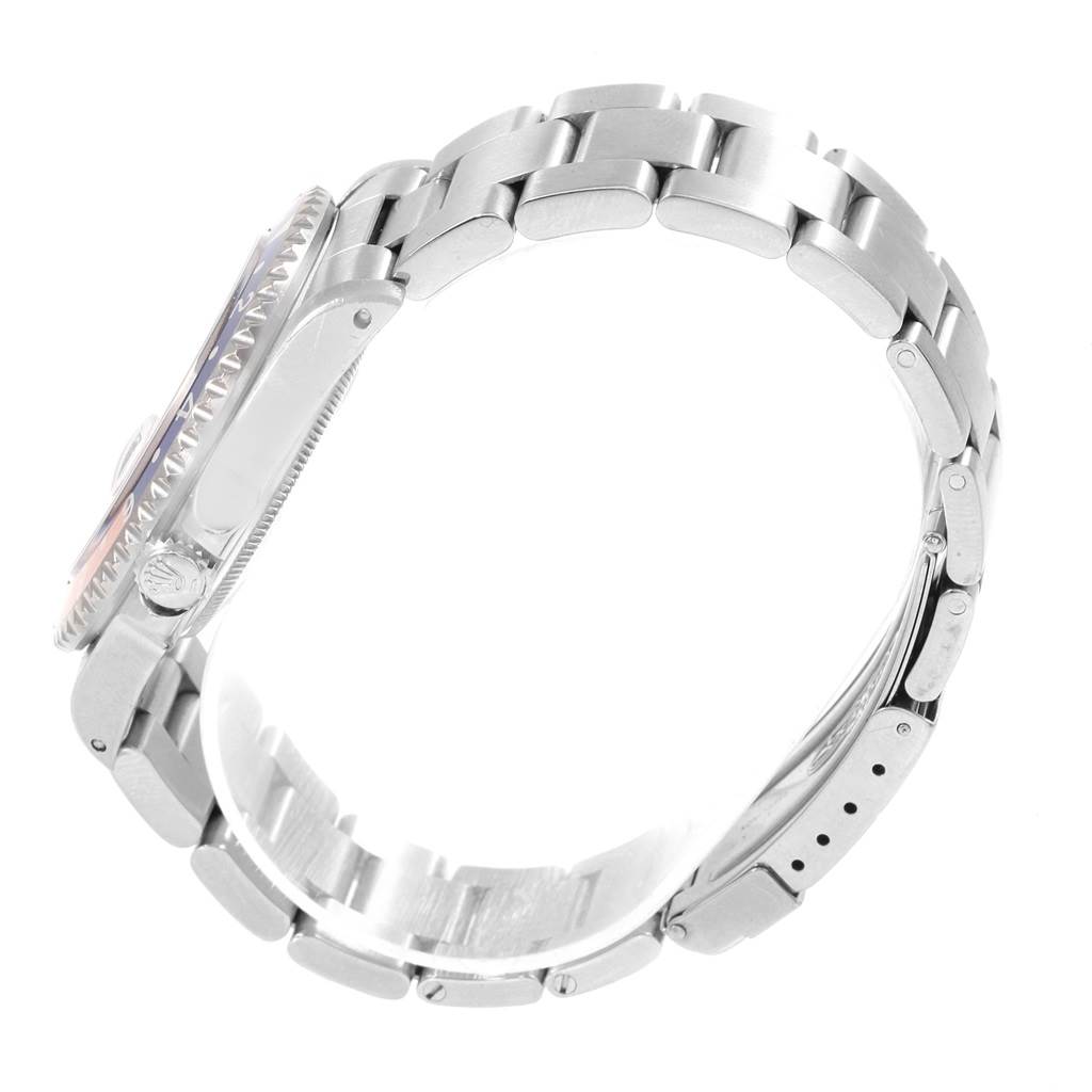 The image shows a side view of a Rolex GMT-Master 16700 Men's Stainless Steel Black Dial 16700 Men's Stainless Steel Black Dial watch, highlighting its stainless steel bracelet and case profile.