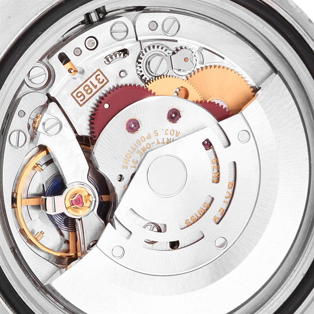 This close-up image shows the intricate mechanical movement inside a Rolex GMT-Master 116710 Men
s Stainless Steel Black Dial 116710 Men
s Stainless Steel Black Dial watch.