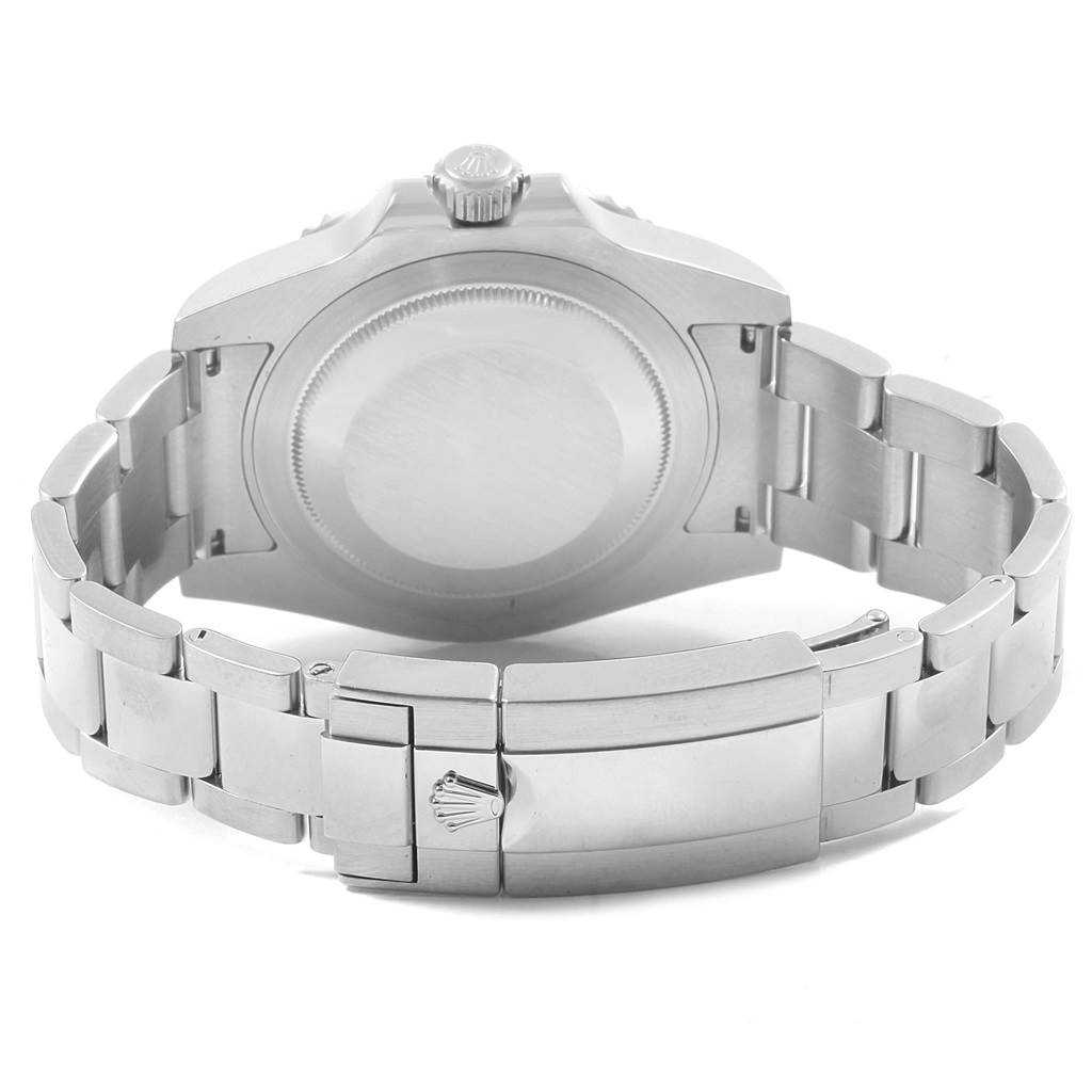 The image shows the back case and stainless steel bracelet clasp of a Rolex GMT-Master 116710 Men
s Stainless Steel Black Dial 116710 Men
s Stainless Steel Black Dial watch from a rear angle.