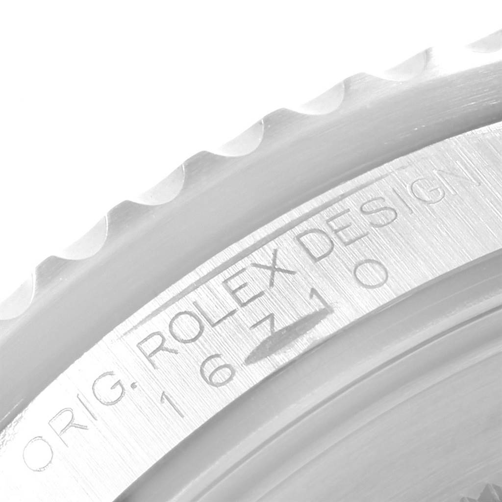 The image shows a close-up of the engraving on the case side of a Rolex GMT-Master 16710 Men's Stainless Steel Black Dial 16710 Men's Stainless Steel Black Dial, displaying the model number and "ORIG ROLEX DESIGN."