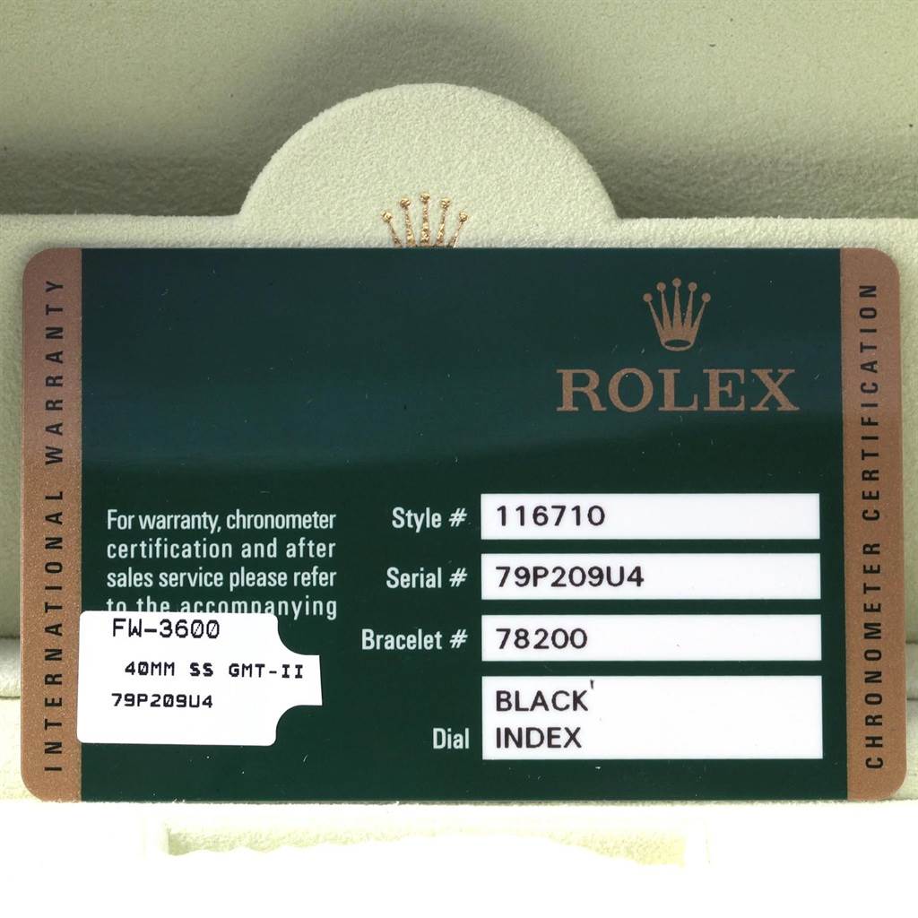 This image shows the international warranty card for the Rolex GMT-Master 116710 Men
s Stainless Steel Black Dial 116710 Men
s Stainless Steel Black Dial model 116710, including details on style, serial, and bracelet number.