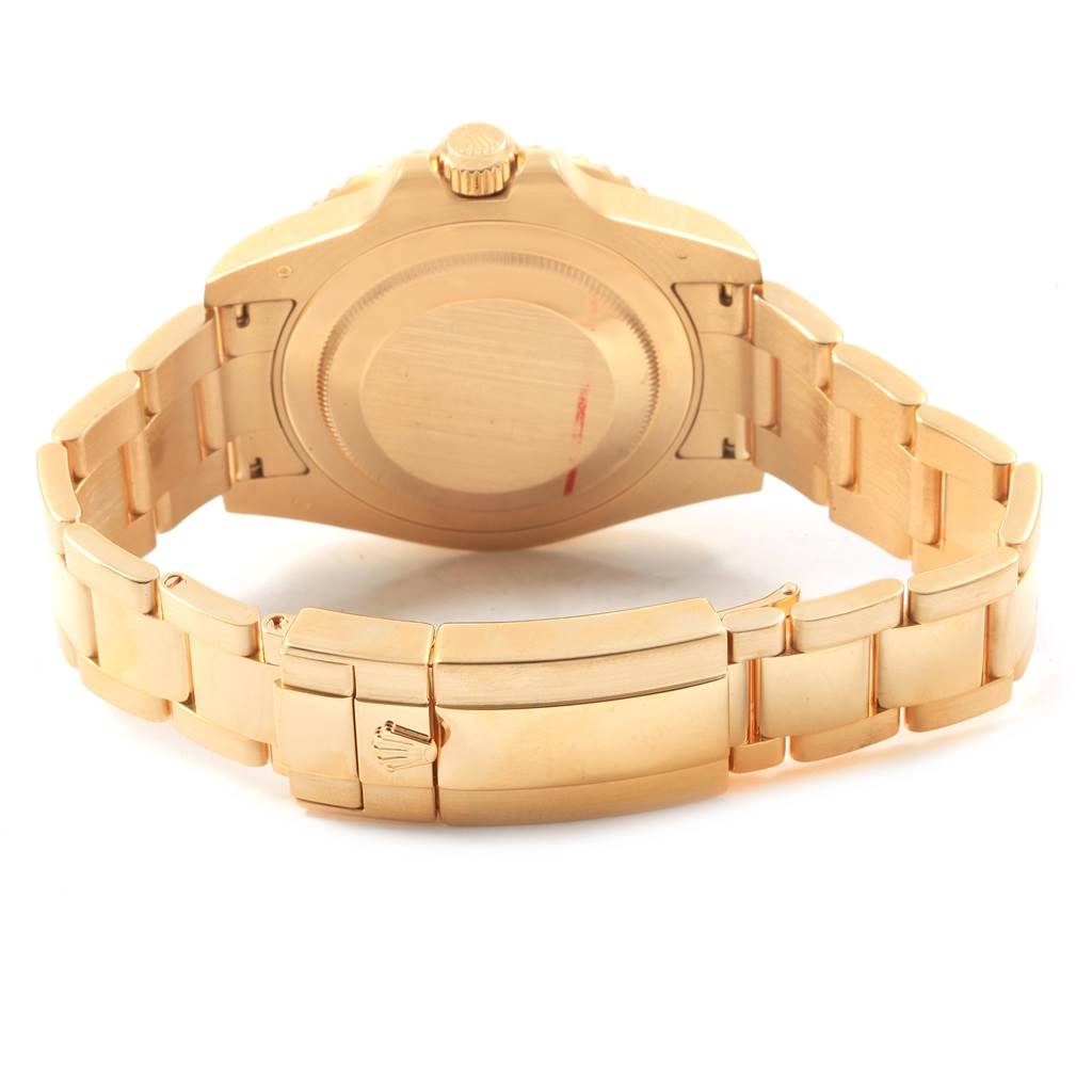 This image shows the back view of a Rolex GMT-Master 116718 Men's Yellow Gold Green Dial 116718 Men's Yellow Gold Green Dial watch, highlighting the case back and bracelet clasp.