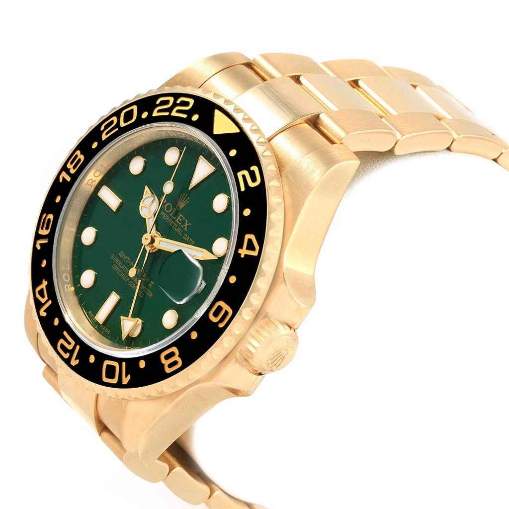 The image shows a side angle of a Rolex GMT-Master 116718 Men's Yellow Gold Green Dial 116718 Men's Yellow Gold Green Dial watch, highlighting the bezel, dial, crown, and bracelet.