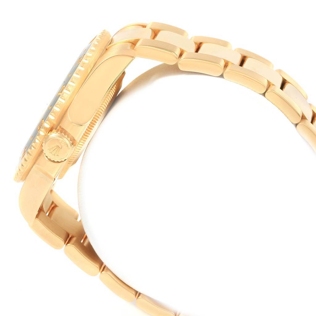 The image shows a side view of the Rolex GMT-Master 116718 Men's Yellow Gold Green Dial 116718 Men's Yellow Gold Green Dial watch focusing on the case, crown, and bracelet.