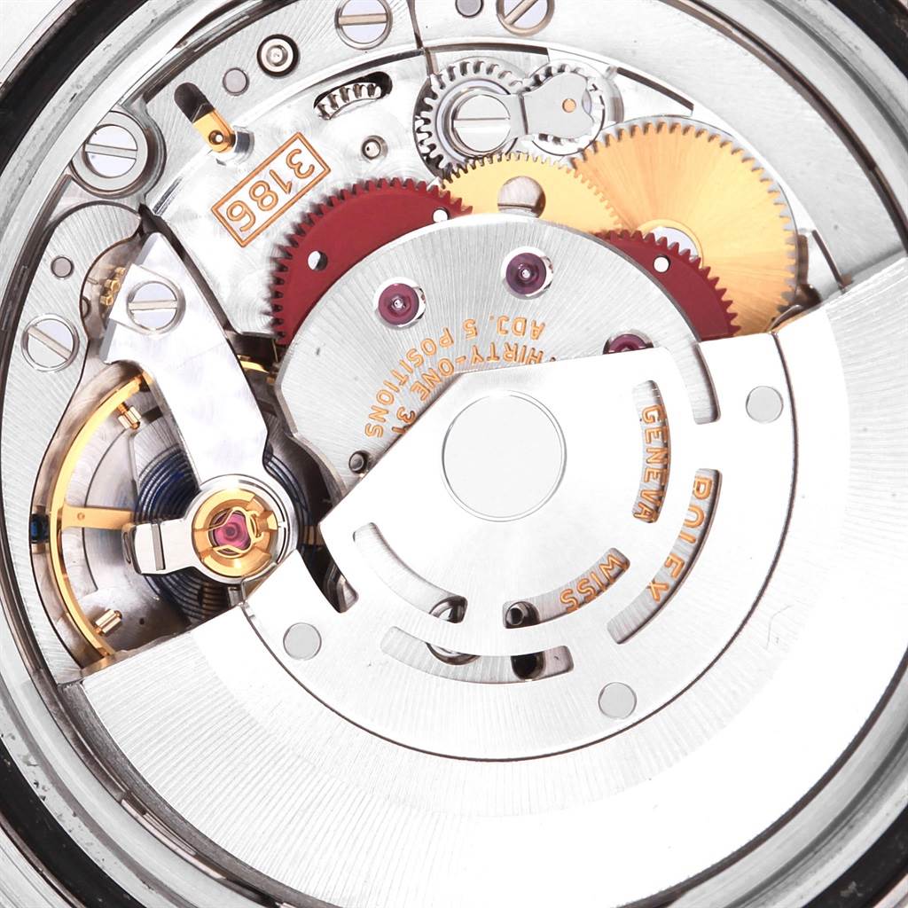 This image shows a close-up of the Rolex GMT-Master 116710 Men's Stainless Steel Black Dial 116710 Men's Stainless Steel Black Dial model's watch movement, including gears and the rotor.