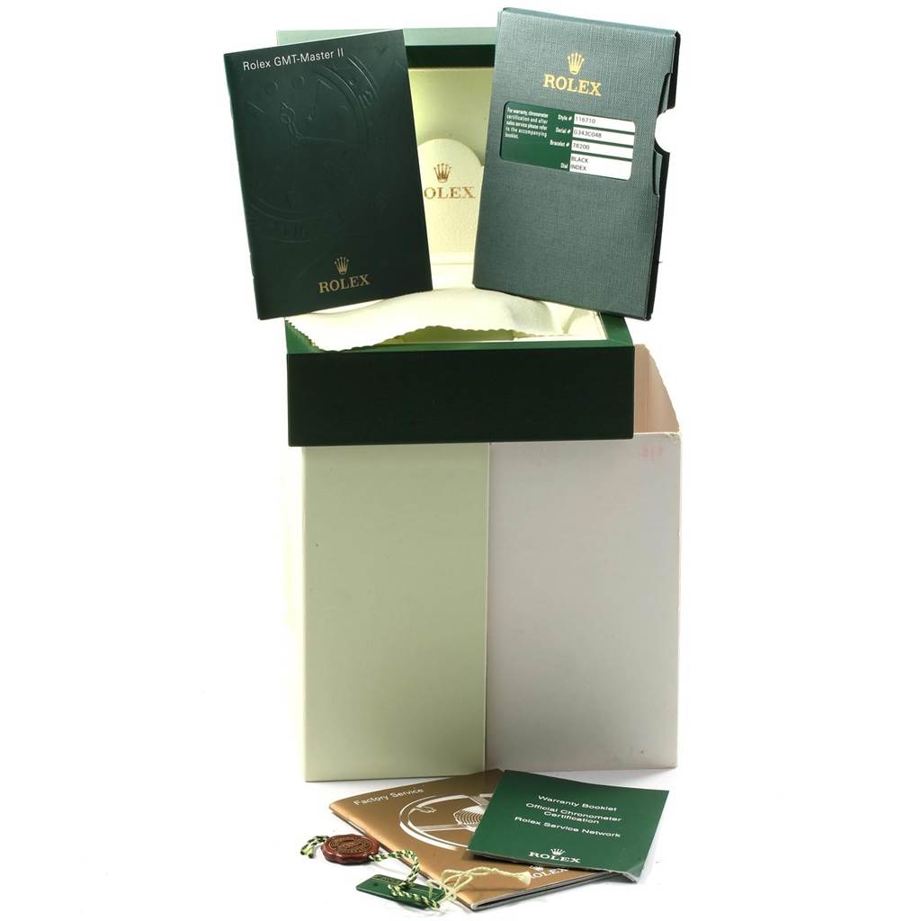 The image shows the packaging and accessories for a Rolex GMT-Master 116710 Men's Stainless Steel Black Dial 116710 Men's Stainless Steel Black Dial II, including the box, warranty card, manuals, and tags.